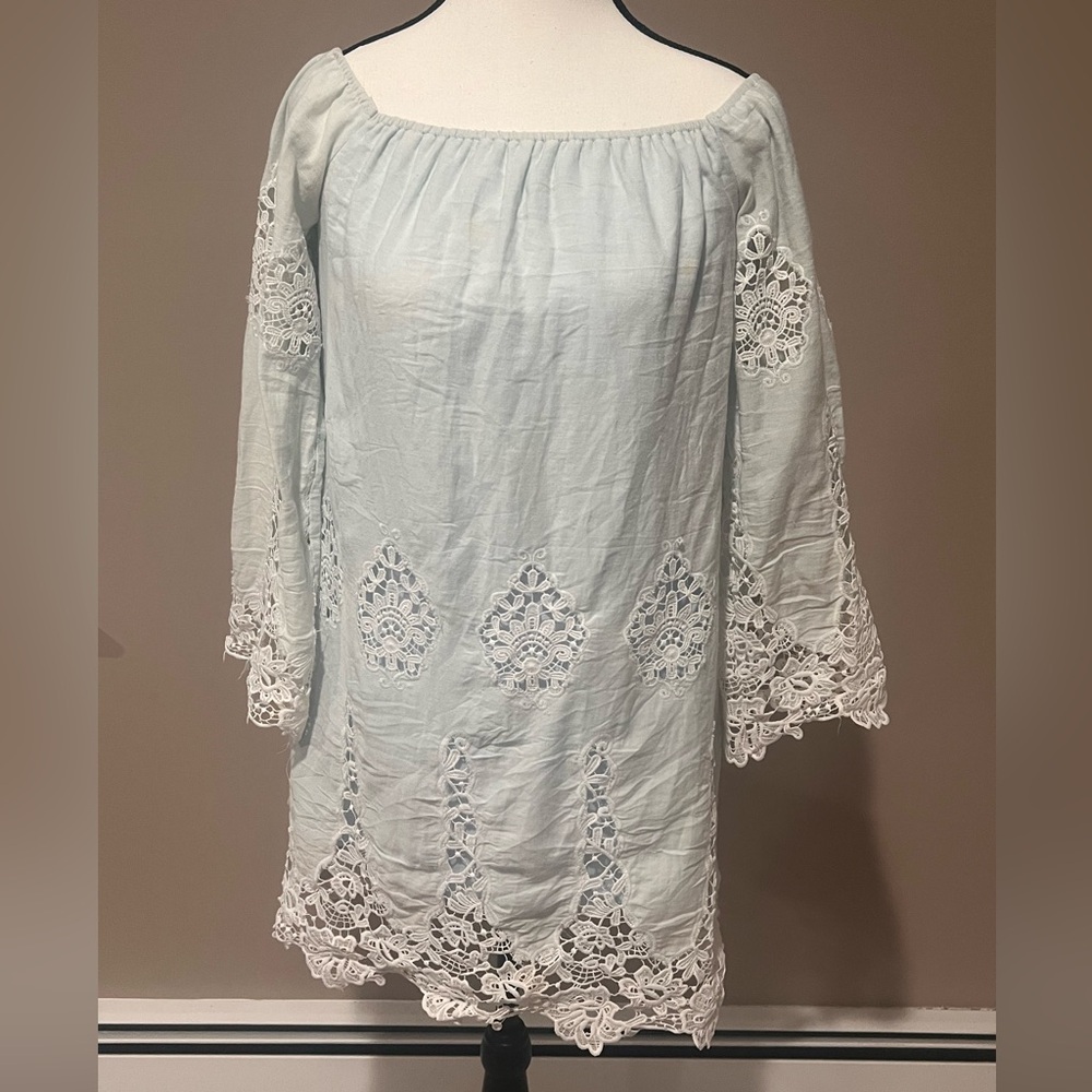 Light blue dress with laced trim